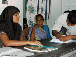 A young man applies for assistance at the Kinniya help center run by the Peace Secretariat for Muslims with USAID support.