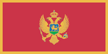 Montenegro flag is a red field bordered by a narrow golden-yellow stripe with the Montenegrin coat of arms centered.