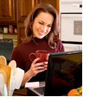 Woman viewing her Meal Planner on the laptop