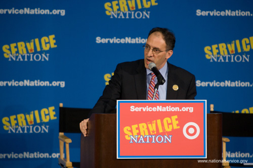 ServiceNation hosted a breakfast for more than 1,200 people on Martin Luther King Day, January 19, 2009, at Ballou Senior High School in Washington, D.C. The program featured speakers including Secretary of Education Arne Duncan, California First Lady Maria Shriver, Martin Luther King III, Rep. George Miller (D-CA), Rep. John Lewis (D-GA), Washington Mayor Adrian Fenty, TIME Managing Editor Richard Stengel, and actor Tobey Maguire. Demi Moore and Ashton Kutcher introduced and debuted their "presidential pledge," a Web-based video message from entertainment luminaries pledging service commitments.  Pictured: ServiceNation Founder and CEO Alan Khazei.