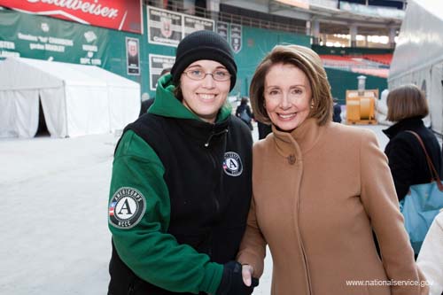 Nancy Pelosi, Speaker of the U.S. House of Representatives, poses with an AmeriCorps NCCC member at Serve DC's signature 2009 Martin Luther King, Jr. Day of Service project, Operation Gratitude, in Washington, DC.  Fueled by President Obama’s call to service, the 2009 Martin Luther King, Jr. Day of Service experienced a historic level of participation, as Americans across the country honored Dr. King by serving their communities on the January 19 King Holiday. In total, more than 13,000 projects took place -- the largest ever in the 14 years since Congress encouraged Americans to observe the King Holiday as a national day of service and charged the Corporation for National and Community Service with leading this national effort.