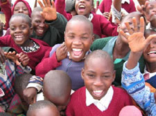 Photo of numerous smiling children in Zimbabwe