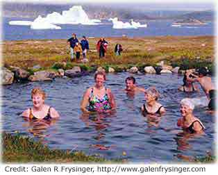 Photo of bathers in a natural warm spring in Greenland. 