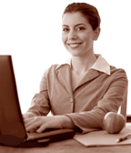 A picture of a woman looking at a computer