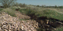 A quarry site with quartzite rubble pile