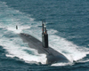 Crewmen aboard the Los Angeles-class nuclear powered attack submarine USS Asheville (SSN 758), man the topside navigation watch as the submarine operates at high speed near San Diego, Calif. (Photo: Department of Defense.)