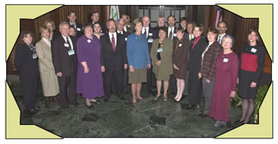 Group picture of Governor Whitman with members of the aging organizations.