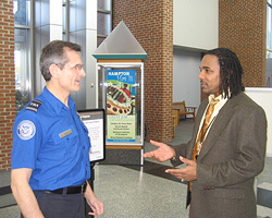 ICMS Coordinator Johnathan Wilkes (right) talks with Lead TSO Lance Horejs.
