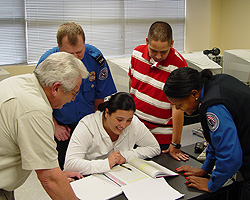From left, Instructor J. D. Richardson, TSOs Gary Lords, Jessica Garcia and Antonio Talamantez, and Expert Behavior Detection Officer Miranda Madison.