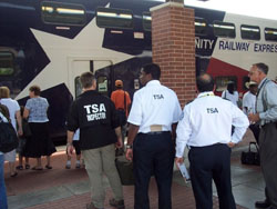 Image of TSA inspectors next to Railway Express train