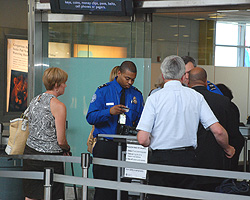 Photo of a TSO with passengers