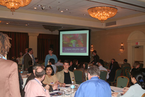 Photo of attendees conversing during junior investigator session