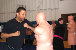 A course participant practices defensive techniques at the 

CMSD Training class in Denver.