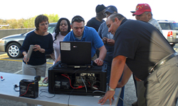 The hands-on training included using a high-frequency radio. From left, George Bush Intercontinental 
Airport (Houston) Coordination Center Officers (CCOs) Mary Morgan and Sabrina Adelkoya; from San Antonio International Airport, CCO Adam Mayes; Expert CCO 
Joe Gibson; STSO Efrain Briones; and TSM Adan Gonzales.