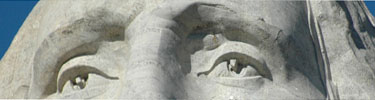Color photo of George Washington's eyes as they are carved on Mount Rushmore.