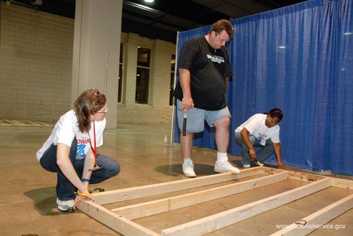 The National Conference on Volunteering and Service in Philadelphia offers many opportunities for service. Volunteers  work on the frame for the a house that will be shipped by truck to Gulfport, MS. The house will be completed in Gulfport and presented to a family left homeless by the hurricanse that struck the Gulf Coast in 2005. Project partners included YouthBuild Philadelphia Charter School and YouthBuild USA. AmeriCorps members serving with the YouthBuild Philadelphia Charter School helped manage the build.