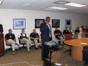 James Scott makes a vulnerability assessment presentation at Denver International Airport in advance of the DNC. Photo by Susan Heidricke