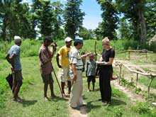 Photo of FESS staff working with World Wildlife staff, Terai Arc Landscape Ranger and members of the Bardia National Park buffer zone community forest group in Nepal. Source: USAID/FESS