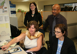 Photo of TSA's Electronics Stewardship Team. In back from left, Holly Tuck and Larry Rowe; front, Karen Nason and Kathryn Jones.