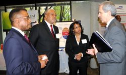 Pictured, from left, Robert Boone, Program Manager; Charley S. Burruss and Dana Law of Sankora Executive Solutions; and Daryl Shall, Deputy Assistant Administrator, Office of Acquisition.