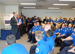 Security Operations Assistant Administrator Lee Kair briefs employees at a Town Hall meeting in Cincinnati.