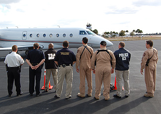 Visible Intermodal Prevention and Response teams such as this one, powered by Customs and Border Protection (CBP), CBP's Air and Marine Interdiction Team, Lakeland (Fla.) police, TSA, Federal Air Marshal Service and Immigration and Customs Enforcement, kept commercial and general aviation airports safe before, during and after Super Bowl XLIII.