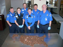 At Bismarck Municipal, from left, Supervisory TSO Pat Conmy, TSO Ericka Barnick, Lead TSO DeWayne Olson, TSOs Cheryl Berg, Tim Vander Laan, and William Berlo.