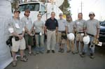 Covington, LA - President Bush and his wife, First Lady Laura Bush, last week joined a group of AmeriCorps members serving with Habitat for Humanity at a work site in nearby Covington, La., where the members are building houses for three families who lost their homes in Hurricane Katrina.