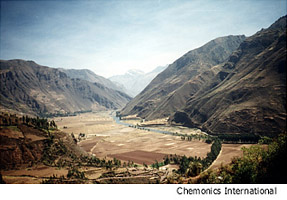 River flowing in a desert canyon between mountains. Photo Source: Chemonics International