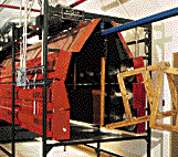 Wood product being fitted on machine