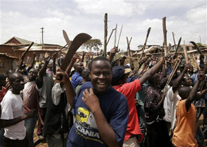 Kenyans reach out to receive food aid in the Kibera slum in Nairobi. As result of the post-election mayhem, the country faces a humanitarian crisis.