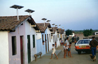 Photo of 50 watt PV systems installed in homes in Brazilian village to provide lighting.