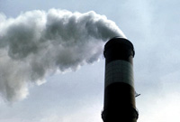 Photo of Factory emitting greenhouse gases into the air.