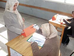 Photo of: Women get involved in the election process, many for the first time