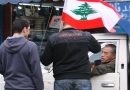 Members of the Youth Network in Nabatyeh discuss the meaning of independence with a passing truck driver.