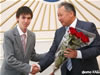 President Bakiev presents a certificate to one of the 50 top achievers on the National Scholarship Test
