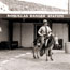 Park Ranger riding a burro at the Boquillas Ranger Station, 1960s