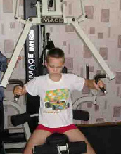 Sergey Mikhailov exercises in a gym built as a result of the Louchegorsk Community Action Plan.