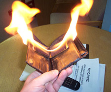 Photo of magician's wallet in flames