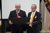 USCIS Director Emilio T. González presents Dr. Samuel Saldívar with the “Outstanding American by Choice” recognition in West Point, NY, May 17, 2007