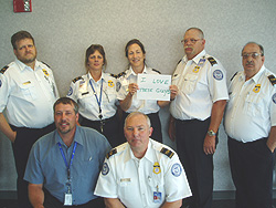 Photo of TSO Becky Sirrs with other Yakima (Wash.) Air Terminal/McAllister Field TSOs