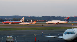 Airplanes from four different airlines at Ronald Reagan Washington National Airport