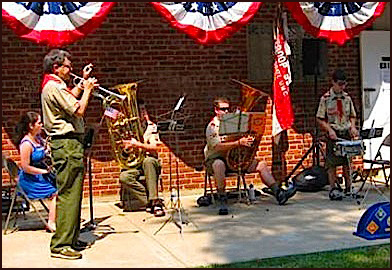 Ken with the Aldersgate Boy Scout Troop 996 Band at a July 4th event.