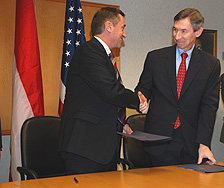 photo of officials shaking hands
