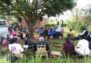 A local government and community dialogue session addresses conflicts over land in the northern Ugandan village of Angaba.