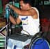 In the Philippines, a wheelchair user works to produce wheelchairs at the Mindanao facility