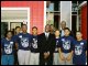 Darrell Green (center) with Best Men from Jefferson Jr. High School and director of the Best Men program at Best Friends Foundation, Valentine Davies.