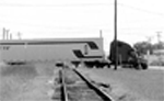 truck crossing railroad tracks