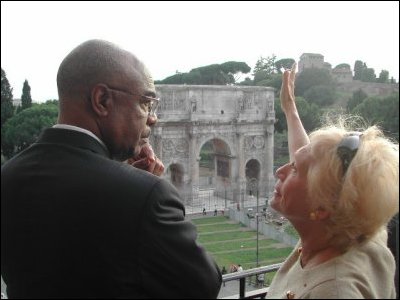 Secretary Paige tours Rome.  Here he is pictured with Archeologist Dr. Iris Love while learning about the Arch of Constantine in Rome.