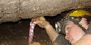 A caver measures wind speed at the Humdinger / NPS file photo